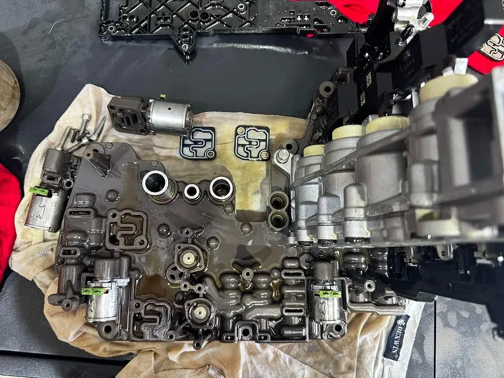 Audi Q5 DSG mechatronic valve body with solenoids removed during repair at StalexAuto