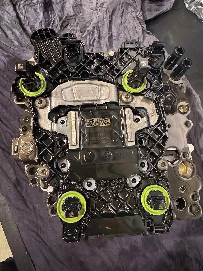 VW Tiguan DSG mechatronic unit during sensor and solenoid repair at StalexAuto